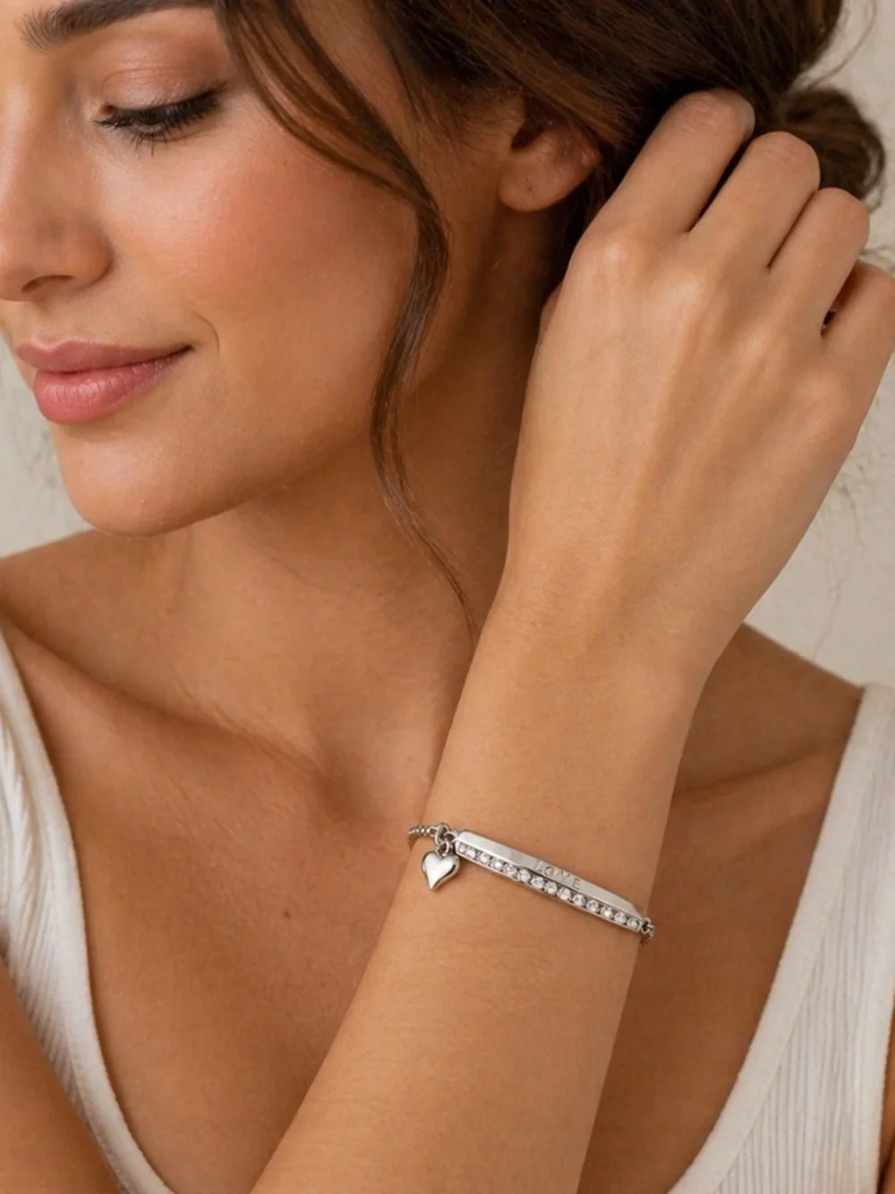 Silver Tone Rhinestone Adjustable Bracelet with Heart Charm Inscribed with Love